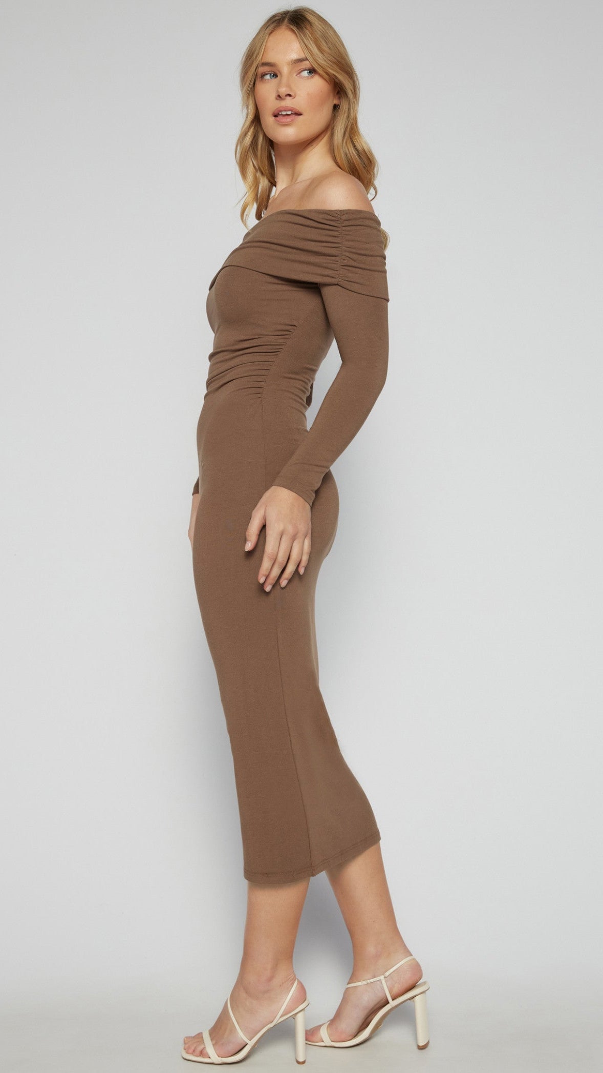 Close-up of The Alyssa Sculpted Fit Dress off-shoulder neckline and sculpted fit.